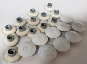 Lakeside Plastics plastisol seal applied under fastener head, white and black grades